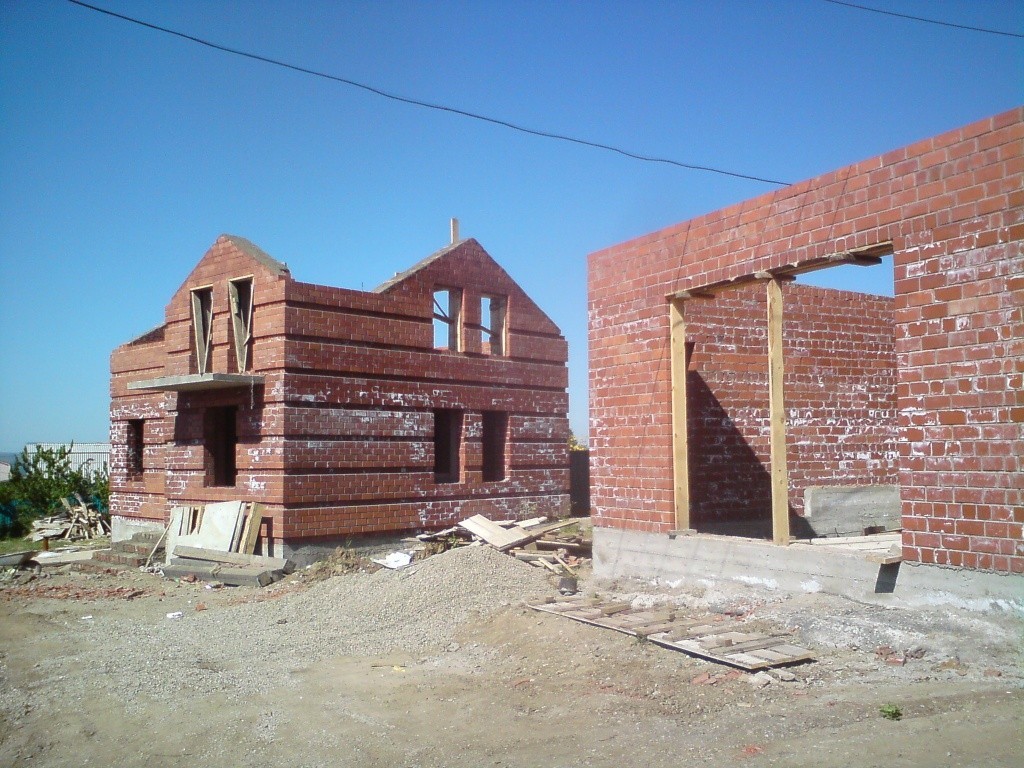 какой дом дешевле построить деревянный или кирпичный